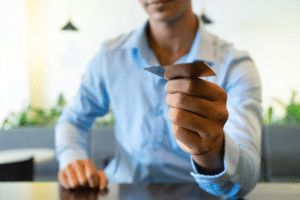 Men using a credit card from Bank of America App.