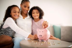 mother and daughters using Savings Accounts for Kids.