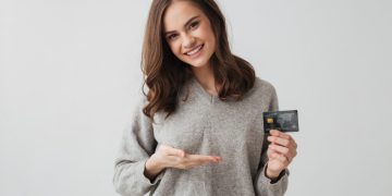 A girl with her Citi Premier Card.