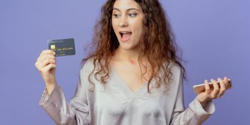 Woman using her Southwest Rapid Rewards credit card.