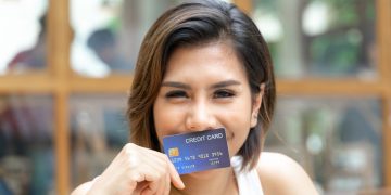 woman using her secure credit card