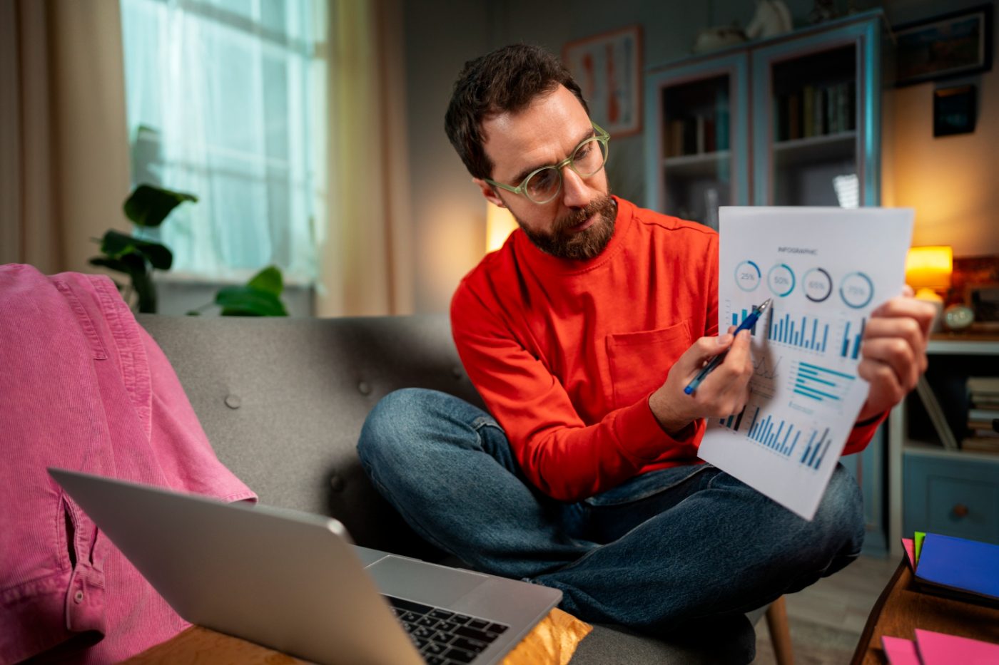 man doing his calculations for financial freedom