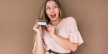 Woman using Cashback Credit Cards.