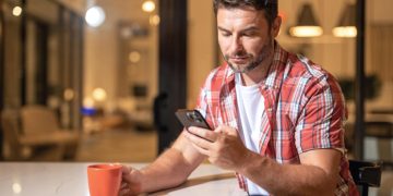 A man using the online bill payment.